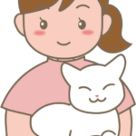 ピンクのスクラブを着た動物看護師